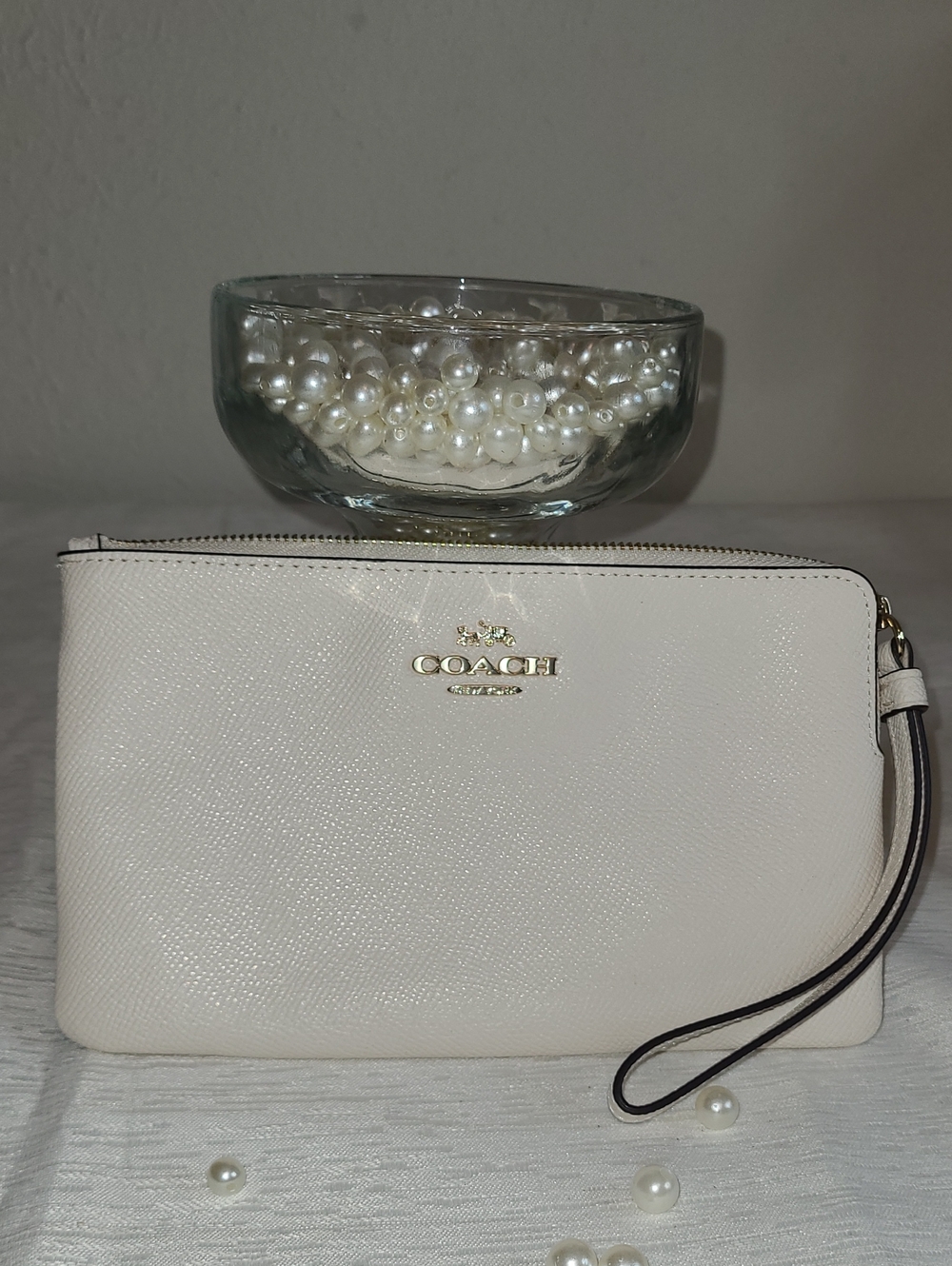Coach Ivory Leather Wristlet Clutch with Gold Logo. Excellent condition